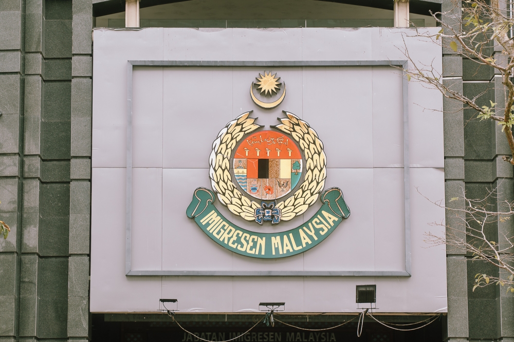 Immigration Raids Expose Major Passport Forgery Ring in Kuala Lumpur; Three Arrested, 119 Forged Documents Seized