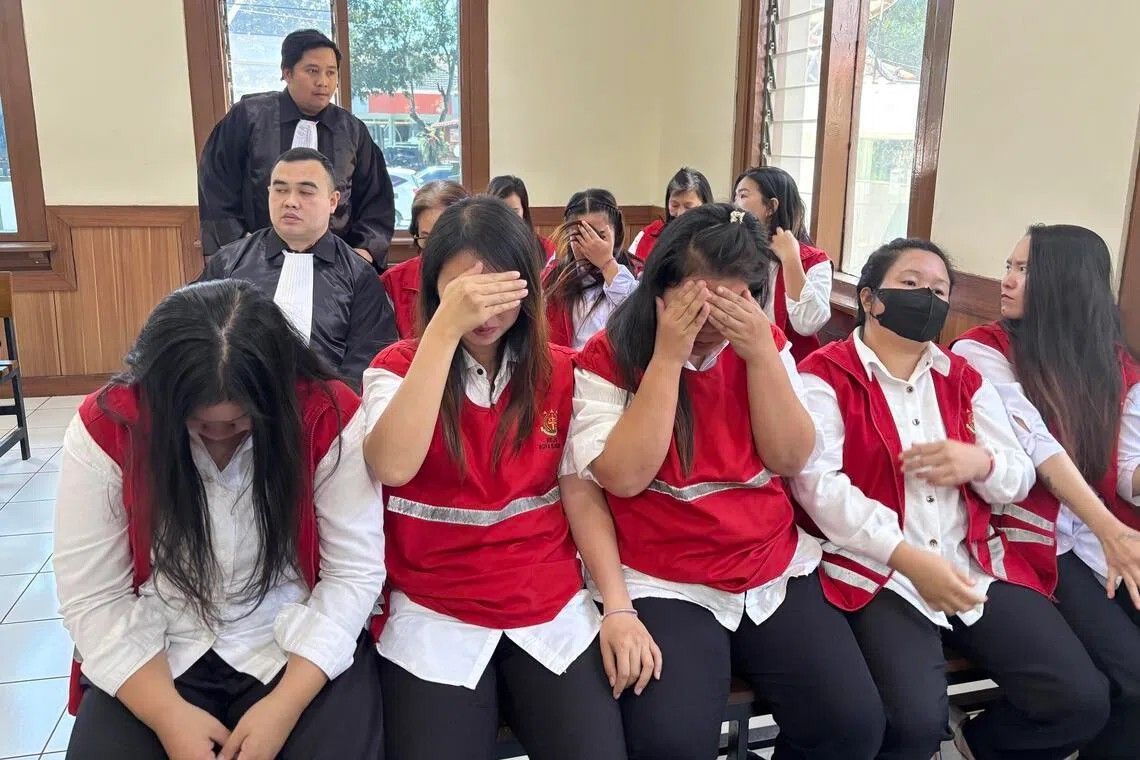 Indonesian court sentences all 19 members of baby-smuggling ring to prison for trafficking infants to Singapore