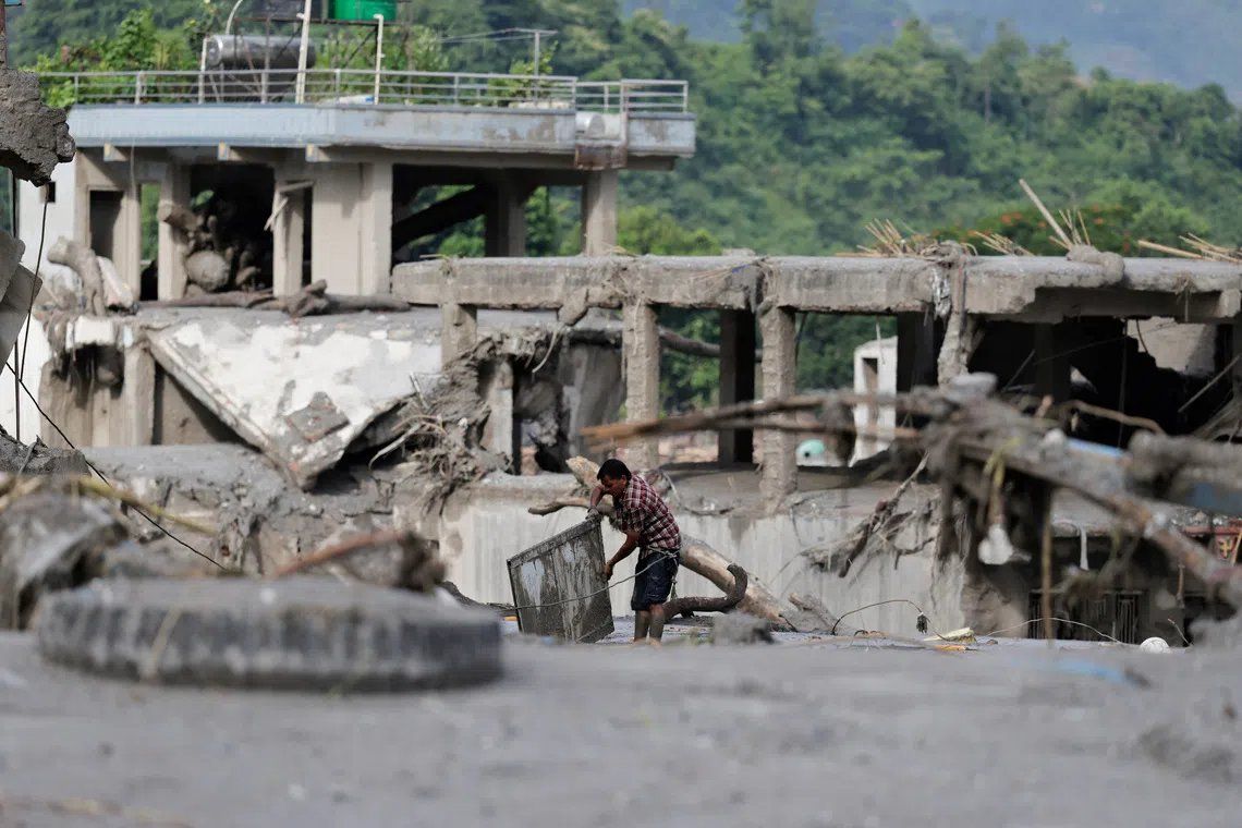 Nepal and China brace for secondary flooding threat as glacier-collapse lakes risk catastrophic breaches