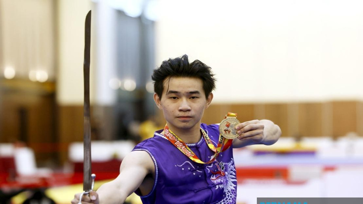 Din Jun Claims Gold in Wushu Finale, Overcomes Injury and Past Disappointments