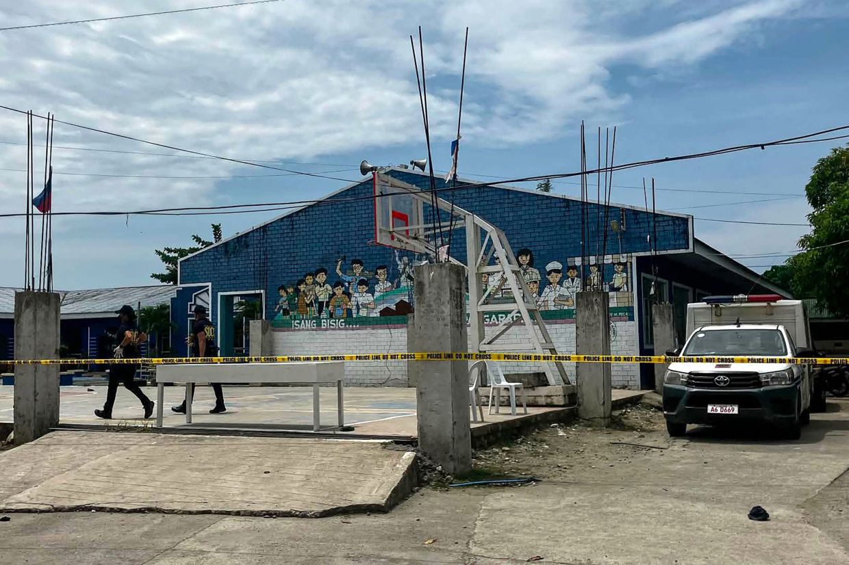 Two teenage shooters kill three students in Philippine high school rampage