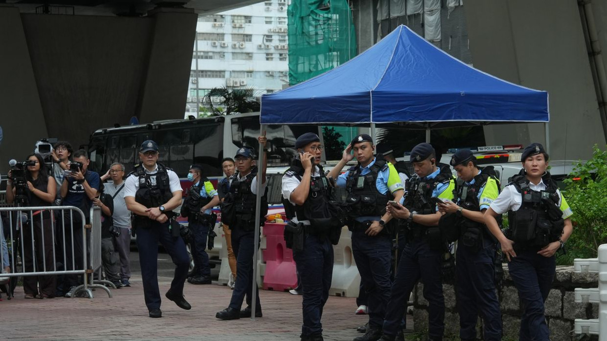 Hong Kong woman detained for T-shirt message as court delivers guilty verdict against democracy activists