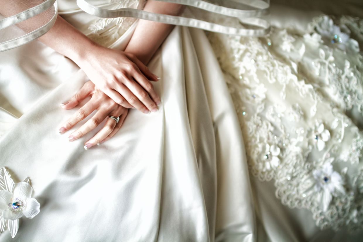 The Emotional Weight of Letting Go: Why Wedding Dresses Hold Such Powerful Sway Over Us
