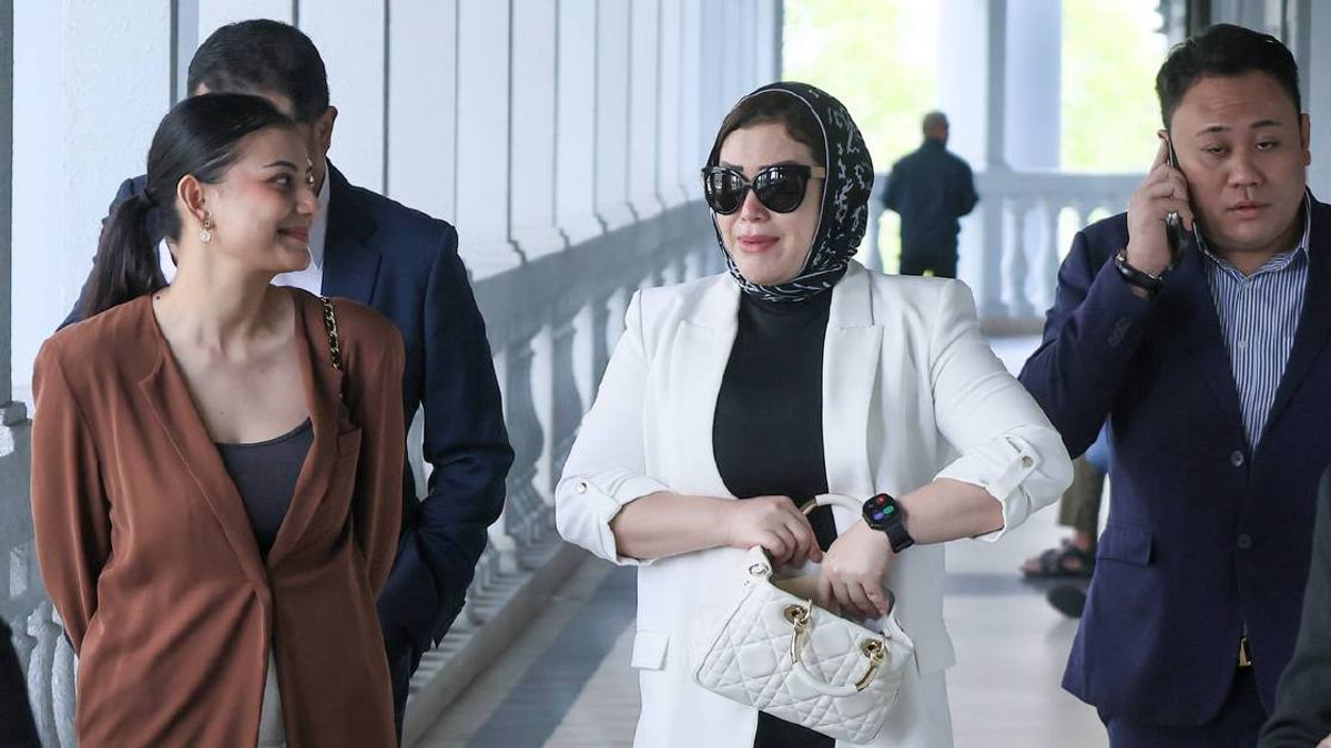 Zizie Izette acquitted of abetting late husband Bung Moktar in Felcra corruption case