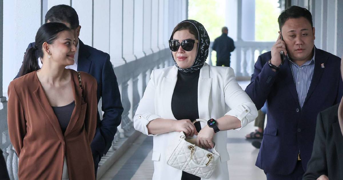 Zizie Izette acquitted of abetting late husband Bung Moktar in Felcra corruption case