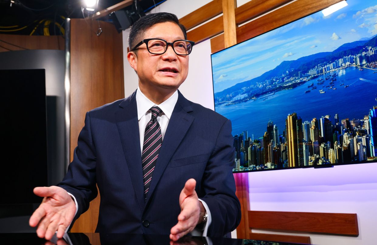 Hong Kong to pursue 'no limits' accountability for Tai Po fire; security chief Chris Tang vows prosecutions regardless of witness cooperation