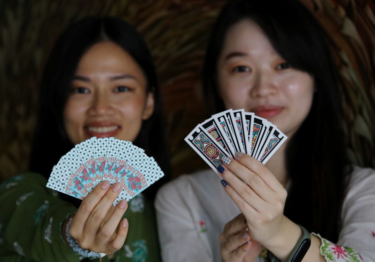 Sisters revive Cherki card game with colourful redesign to reconnect young Peranakans with heritage