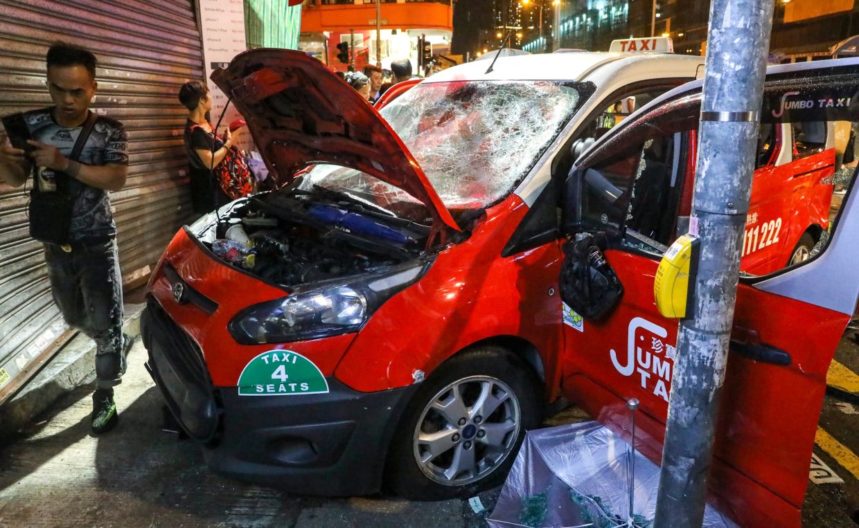 Hong Kong Woman Seeks Damages After Taxi Strikes Her During 2019 Protest