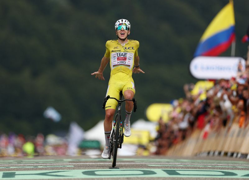 Pogacar extends Tour de France lead with commanding stage 14 victory in the mountains