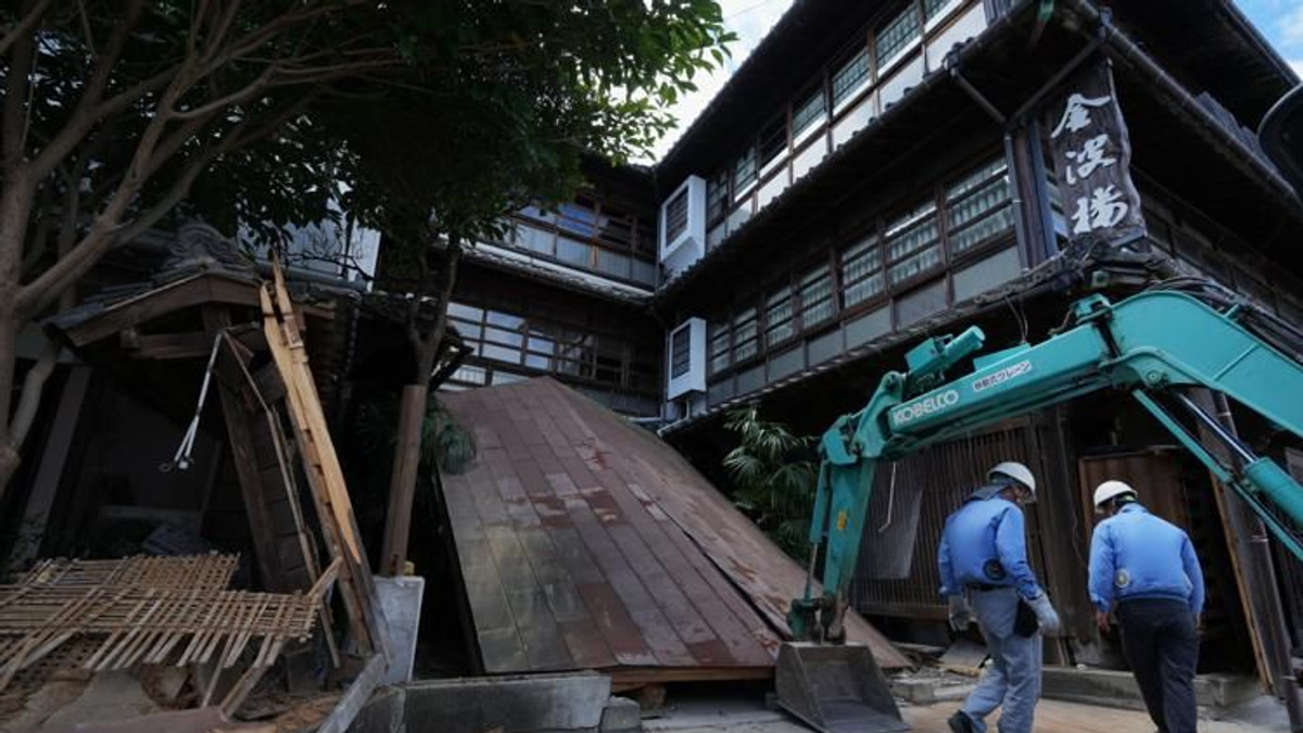 Japan's Kumamoto battles deadly heat and shortages as earthquake toll climbs
