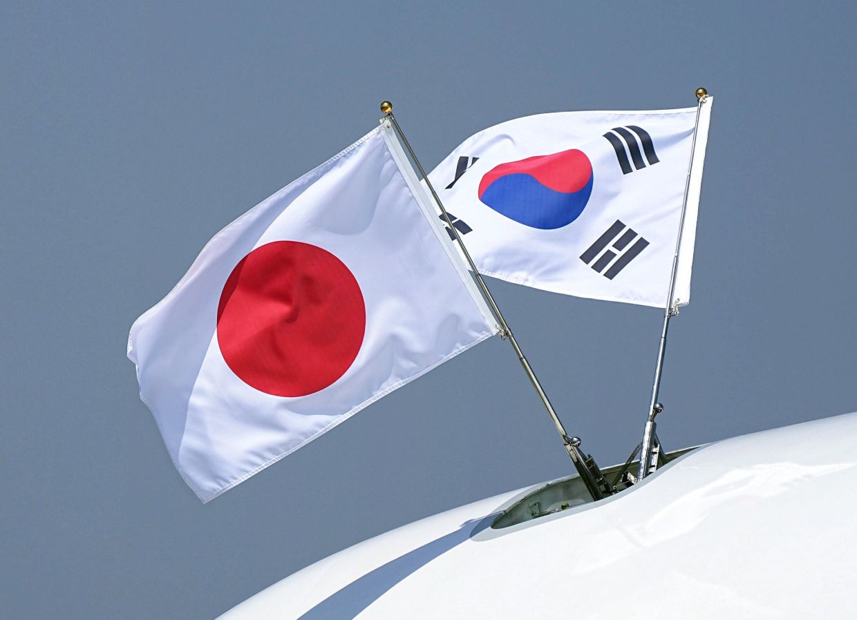 Nuclear Dominoes in Asia: How One Country's Weapons Could Trigger Regional Proliferation