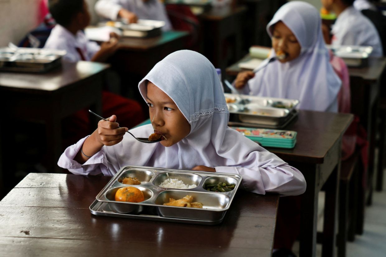Indonesia's Education Law Revision Sparks Fears Over Free Meals Funding Loophole